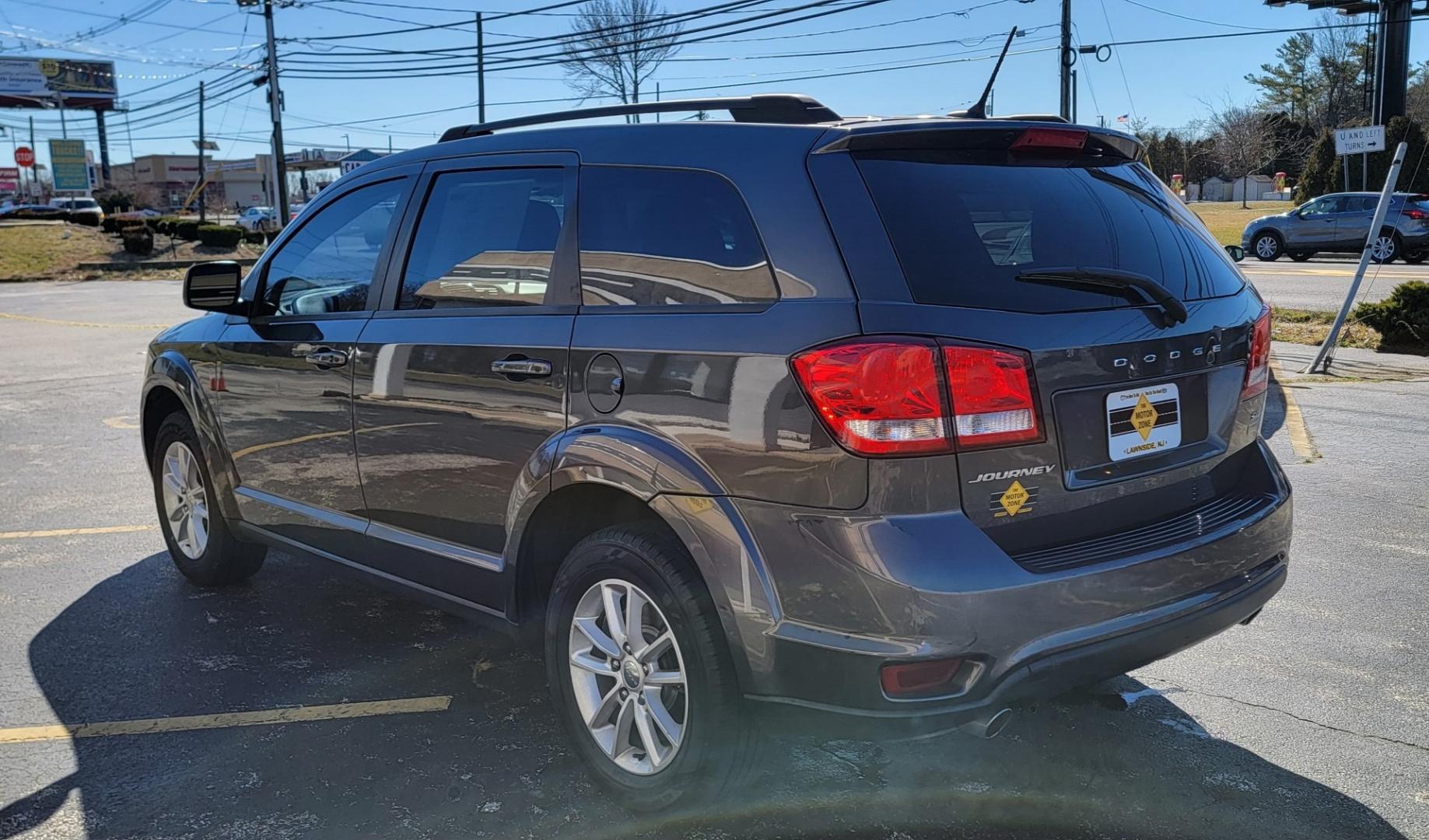 2016 Gray /Black Dodge Journey SXT (3C4PDCBGXGT) with an 3.6L V6 DOHC 24V engine, Automatic, 6-Spd Auto Stick transmission, located at 341 N White Horse Pike, Lawnside, NJ, 08045, (856) 262-9500, 39.855621, -75.027451 - Photo#3